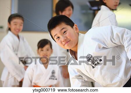 Stock Photo - Japanese kids karate class. Fotosearch