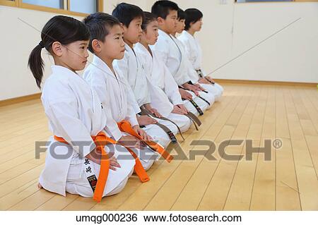 Stock Photograph - Japanese kids karate class. Fotosearch