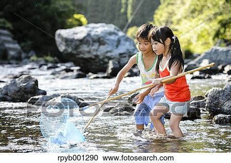 Japanese kids playing at the river View Large Photo Image Stock Image - Japanese kids playing at the river. Fotosearch
