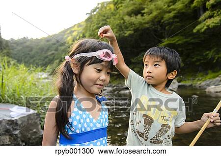 Japanese kids playing at the river View Large Photo Image Stock Image - Japanese kids playing at the river. Fotosearch