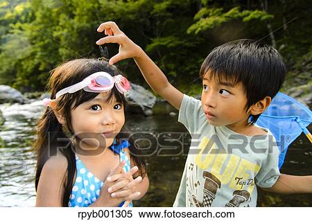 Japanese kids playing at the river View Large Photo Image Stock Photography - Japanese kids playing at the river. Fotosearch