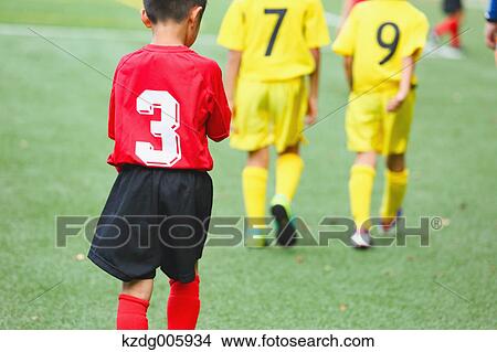 Japanese kids playing soccer View Large Photo Image Picture - Japanese kids playing soccer. Fotosearch