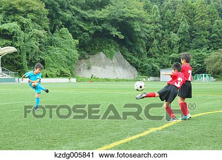 Japanese kids playing soccer View Large Photo Image Stock Image - Japanese kids playing soccer. Fotosearch