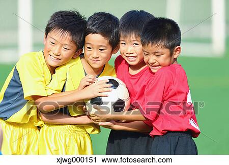 Japanese kids playing soccer View Large Photo Image Stock Image - Japanese kids playing soccer. Fotosearch