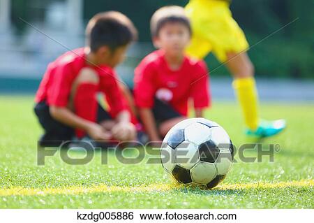 Japanese kids playing soccer View Large Photo Image Stock Photograph - Japanese kids playing soccer. Fotosearch