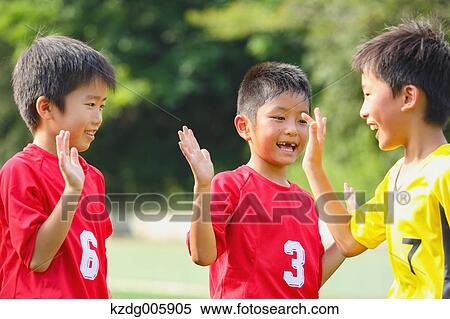Japanese kids playing soccer View Large Photo Image Stock Photography - Japanese kids playing soccer. Fotosearch