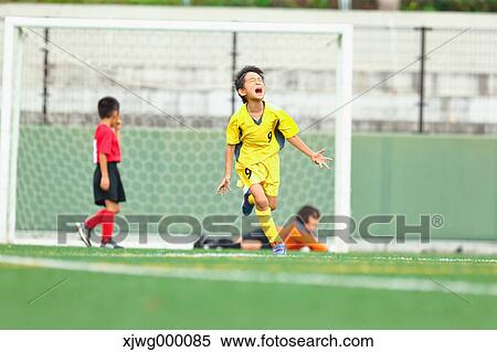 Japanese kids playing soccer View Large Photo Image Stock Photography - Japanese kids playing soccer. Fotosearch