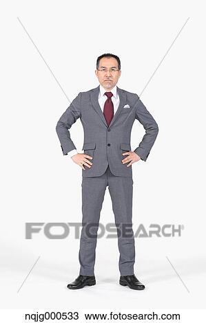 Stock Image - Japanese senior businessman on white background. Fotosearch