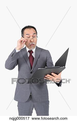 Japanese senior businessman on white background View Large Photo Image Stock Photo - Japanese senior businessman on white background. Fotosearch