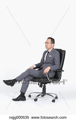 Stock Photography - Japanese senior businessman on white background. Fotosearch