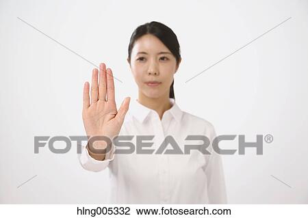 Japanese woman performing touch gesture View Large Photo Image Stock Image - Japanese woman performing touch gesture. Fotosearch