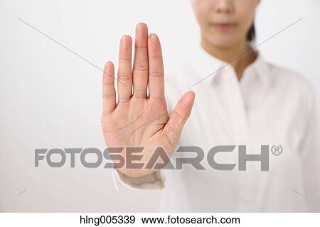 Japanese woman performing touch gesture View Large Photo Image Stock Photo - Japanese woman performing touch gesture. Fotosearch