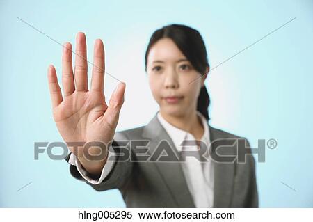 Japanese woman performing touch gesture View Large Photo Image Stock Photography - Japanese woman performing touch gesture. Fotosearch