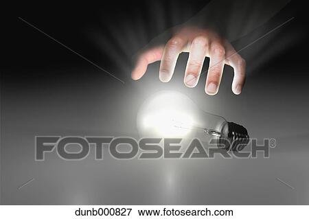 Japanese woman with light bulb View Large Photo Image Stock Photo - Japanese woman with light bulb. Fotosearch