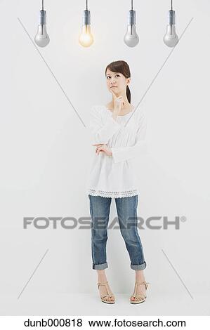 Japanese woman with light bulbs View Large Photo Image Stock Photo - Japanese woman with light bulbs. Fotosearch