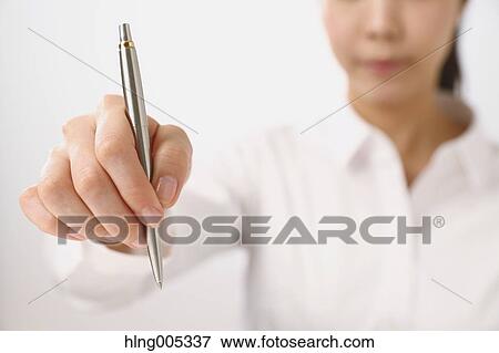 Stock Photo - Japanese woman with pen. Fotosearch