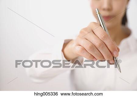 Japanese woman with pen View Large Photo Image Stock Photograph - Japanese woman with pen. Fotosearch