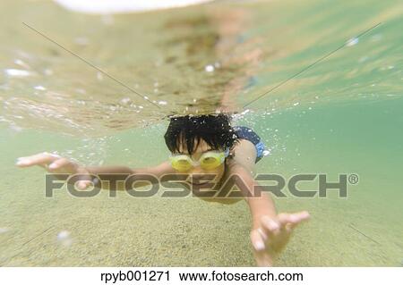 Kid at the beach View Large Photo Image Stock Image - Kid at the beach. Fotosearch