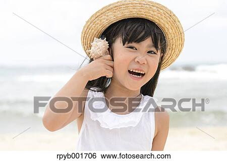 Kid at the beach View Large Photo Image Stock Photograph - Kid at the beach. Fotosearch