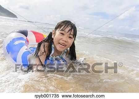 Kid at the beach View Large Photo Image Stock Photography - Kid at the beach. Fotosearch