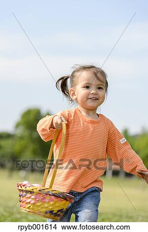 Kid playing in a city park View Large Photo Image Picture - Kid playing in a city park. Fotosearch