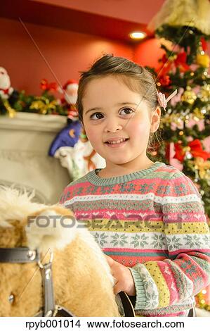 Kid playing in the house at Christmas View Large Photo Image Picture - Kid playing in the house at Christmas. Fotosearch