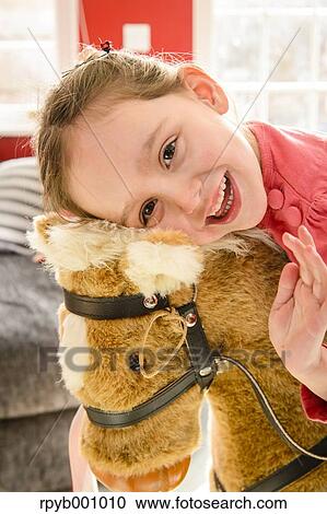 Kid playing in the house at Christmas View Large Photo Image Stock Image - Kid playing in the house at Christmas. Fotosearch