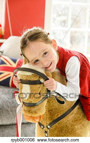 Kid playing in the house at Christmas View Large Photo Image Stock Photograph - Kid playing in the house at Christmas. Fotosearch