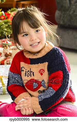 Kid playing in the house at Christmas View Large Photo Image Stock Photography - Kid playing in the house at Christmas. Fotosearch