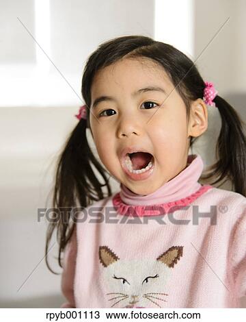 Kid playing in the house View Large Photo Image Stock Image - Kid playing in the house. Fotosearch