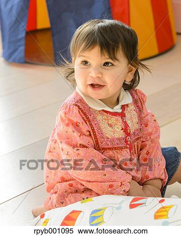 Kid playing in the house View Large Photo Image Stock Photography - Kid playing in the house. Fotosearch