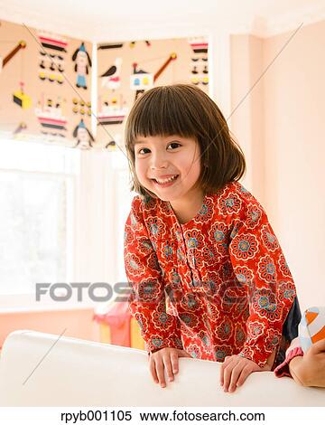 Kid playing in the house View Large Photo Image Stock Photography - Kid playing in the house. Fotosearch