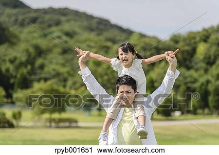 Kid with dad at the park View Large Photo Image Stock Image - Kid with dad at the park. Fotosearch