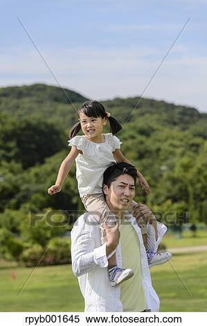Kid with dad at the park View Large Photo Image Stock Photography - Kid with dad at the park. Fotosearch
