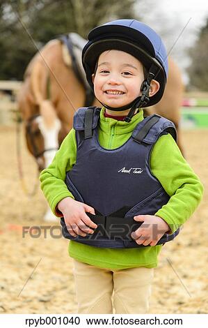 Kid with horse View Large Photo Image Stock Image - Kid with horse. Fotosearch
