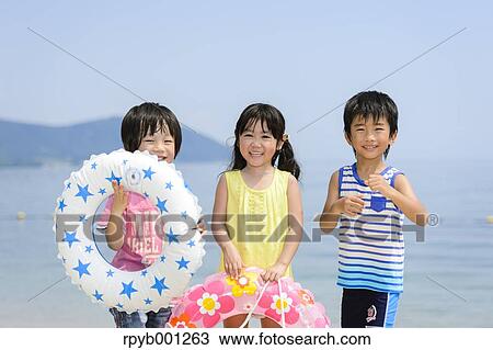Kids at the beach View Large Photo Image Stock Image - Kids at the beach. Fotosearch