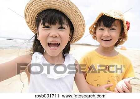 Kids at the beach View Large Photo Image Stock Image - Kids at the beach. Fotosearch