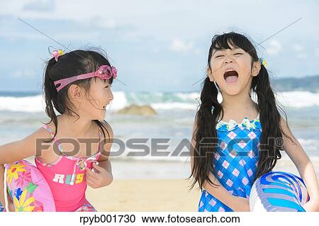 Kids at the beach View Large Photo Image Stock Image - Kids at the beach. Fotosearch
