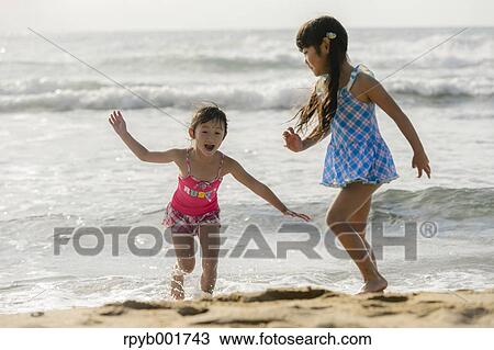 Kids at the beach View Large Photo Image Stock Image - Kids at the beach. Fotosearch