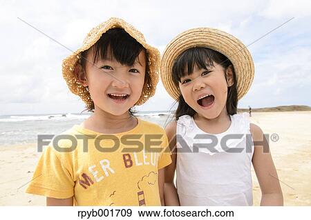 Kids at the beach View Large Photo Image Stock Photo - Kids at the beach. Fotosearch