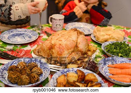 Kids eating in the house at Christmas View Large Photo Image Stock Photograph - Kids eating in the house at Christmas. Fotosearch