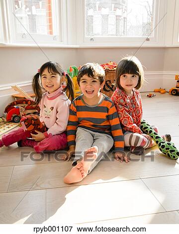 Stock Photo - Kids playing in the house. Fotosearch