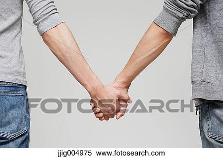Male couple holding hands View Large Photo Image Stock Photography - Male couple holding hands. Fotosearch