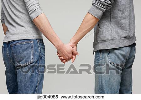 Stock Photography - Male couple holding hands. Fotosearch