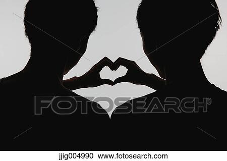 Male couple silhouette View Large Photo Image Stock Image - Male couple silhouette. Fotosearch