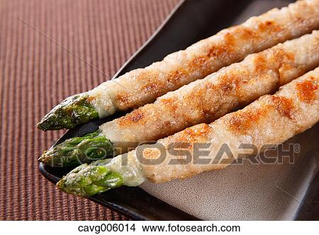 Picture - Meat-rolled asparagus. Fotosearch