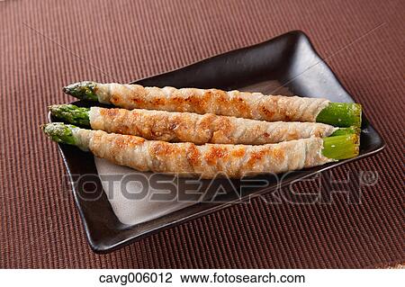 Meat-rolled asparagus View Large Photo Image Stock Image - Meat-rolled asparagus. Fotosearch
