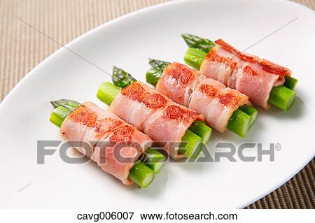Meat-rolled asparagus View Large Photo Image Stock Photo - Meat-rolled asparagus. Fotosearch