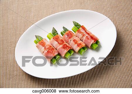 Meat-rolled asparagus View Large Photo Image Stock Photo - Meat-rolled asparagus. Fotosearch