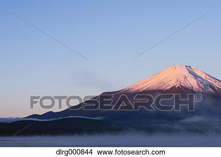 Picture - Morning light illuminating Mount Fuji at Lake Yamanaka, Yamanashi Prefecture, Japan. Fotosearch